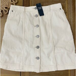 Abercrombie & Fitch NWT
Cream cord skirt button front 
Size XS A-line mini skirt